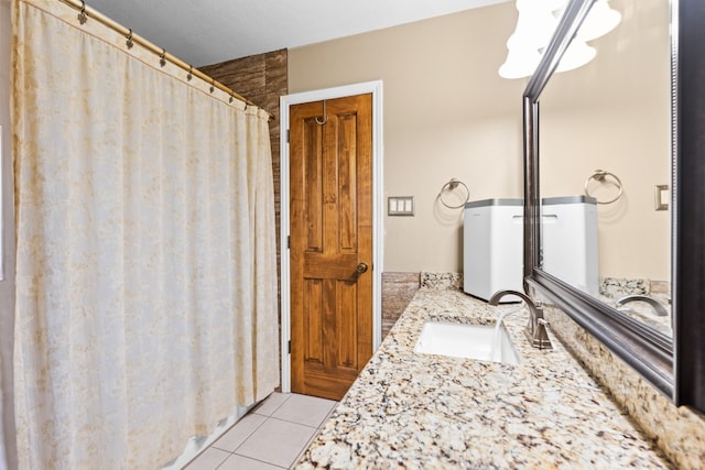 bathroom with vanity and tile patterned flooring