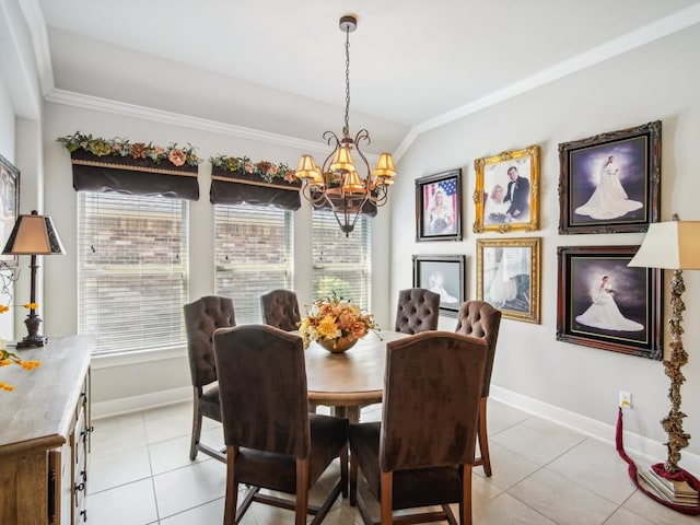 tiled dining space with crown molding, plenty of natural light, and a chandelier