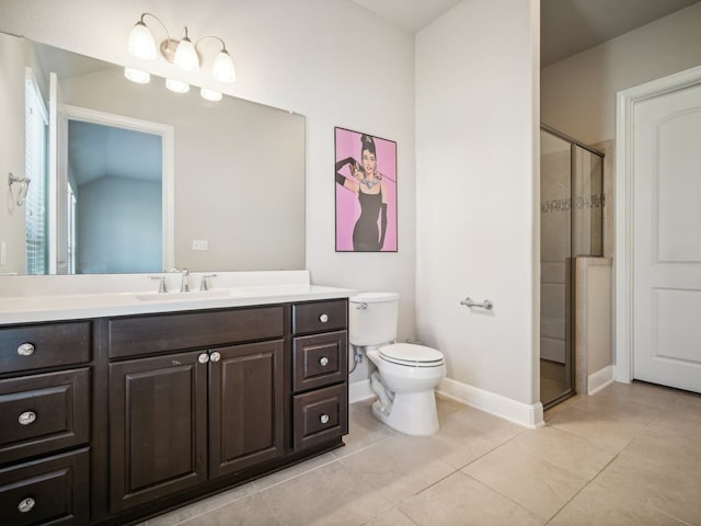 bathroom with vanity, tile patterned floors, vaulted ceiling, toilet, and an enclosed shower