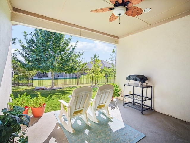 view of patio / terrace featuring ceiling fan