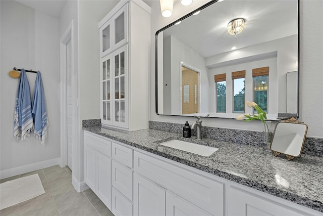 bathroom with vanity and tile patterned floors