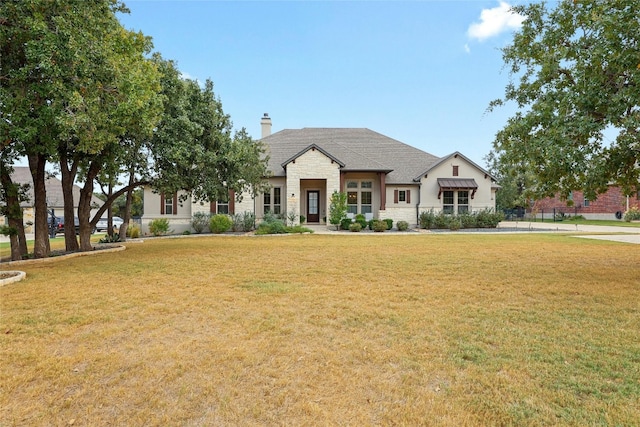 view of front of home with a front lawn