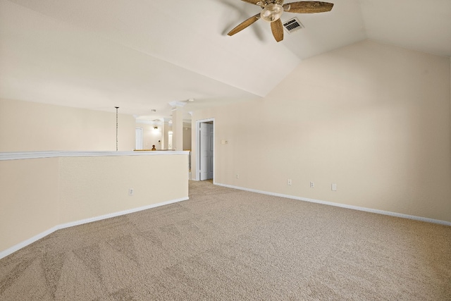 unfurnished living room featuring ceiling fan, carpet, and vaulted ceiling