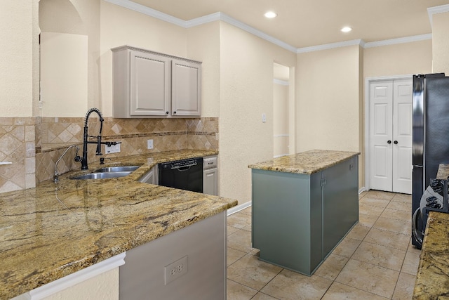 kitchen with ornamental molding, sink, black appliances, a center island, and light stone counters