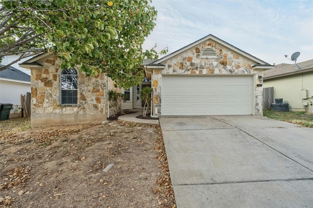 ranch-style home with a garage