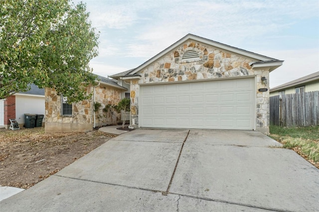 ranch-style home with a garage