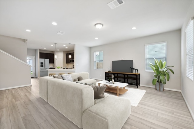 living room featuring light hardwood / wood-style floors