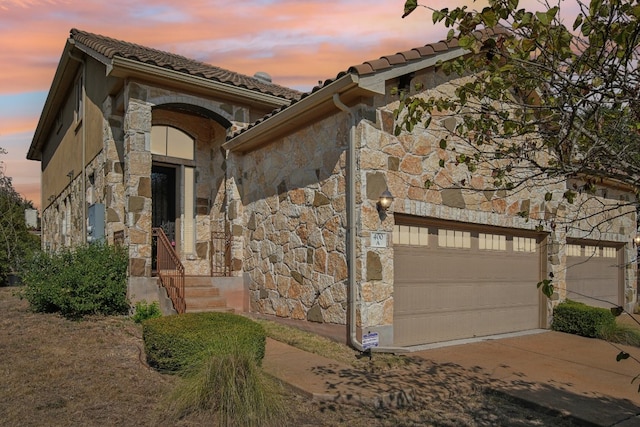 view of front of home featuring a garage