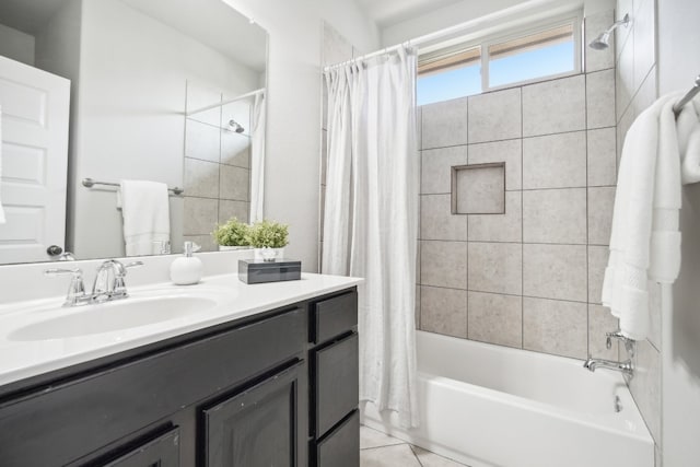 bathroom with vanity, shower / tub combo with curtain, and tile patterned floors