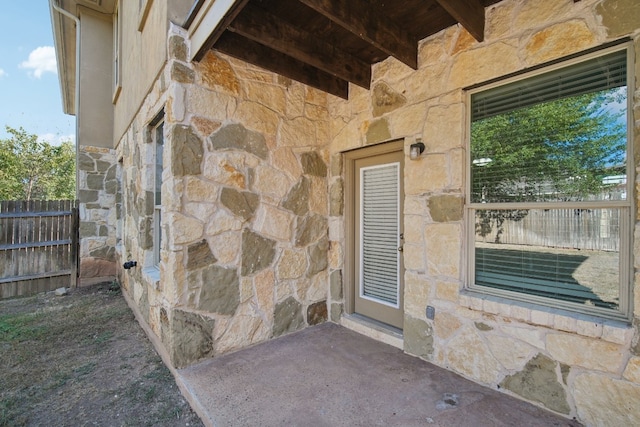 doorway to property featuring a patio