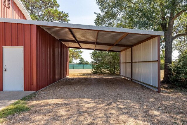 224 Fm 954th Rd, Round Top, TX 78954 - view of car parking featuring a carport and dirt driveway
