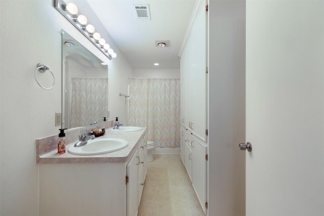 224 Fm 954th Rd, Round Top, TX 78954 - bathroom with toilet, double vanity, and a shower with curtain
