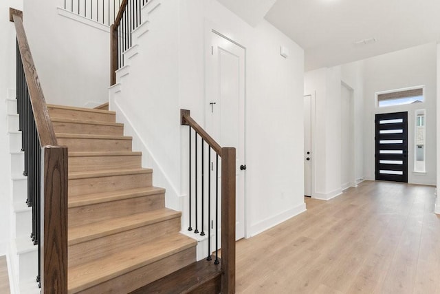 entrance foyer with light hardwood / wood-style floors