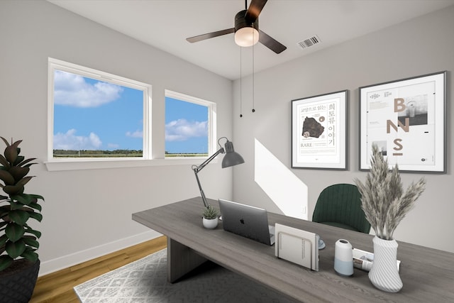 office featuring ceiling fan and hardwood / wood-style floors