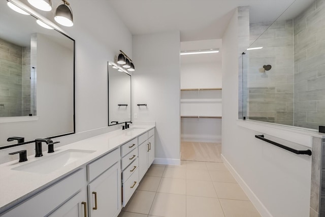 bathroom featuring vanity, tile patterned floors, and an enclosed shower