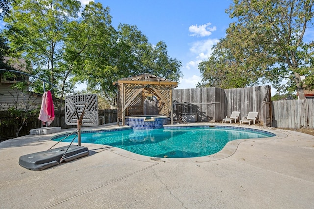 view of pool featuring an in ground hot tub, a gazebo, and a patio