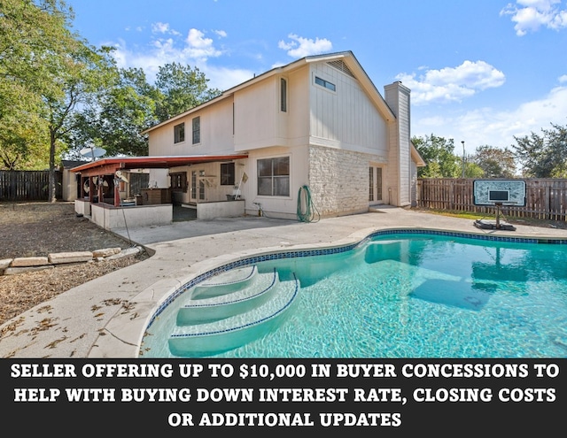 view of swimming pool featuring a patio area, a fenced backyard, and a fenced in pool