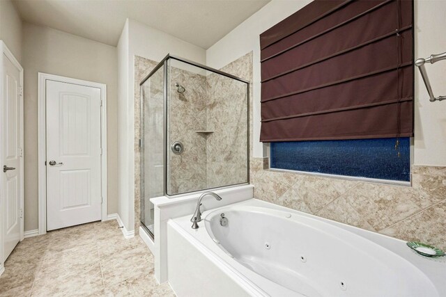 bathroom featuring independent shower and bath and tile patterned flooring