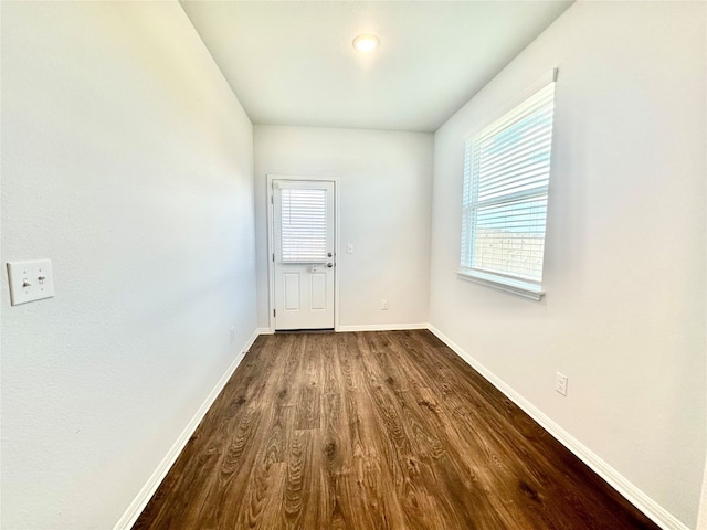 spare room featuring hardwood / wood-style flooring