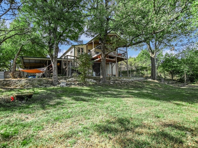 view of yard featuring a wooden deck