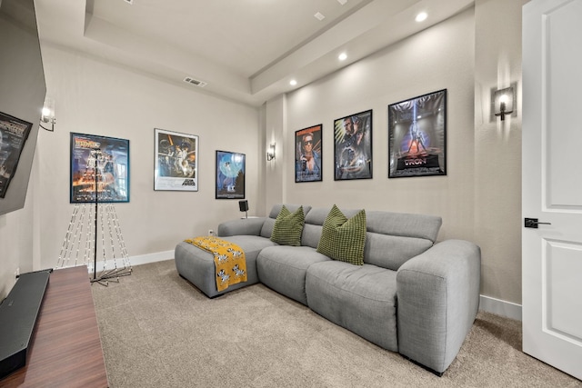 home theater room with wood-type flooring