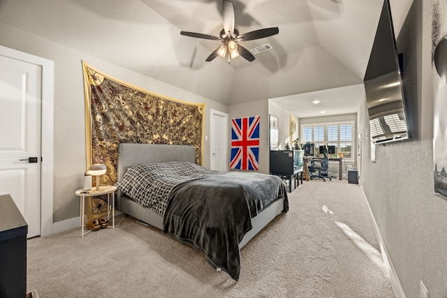 bedroom featuring ceiling fan, vaulted ceiling, and carpet floors