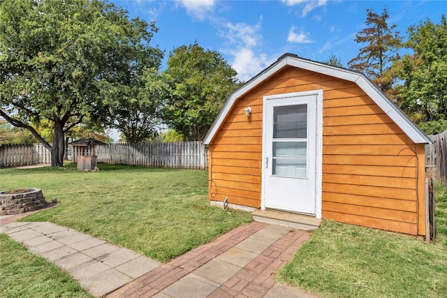 view of outdoor structure with a yard