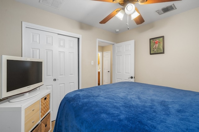 bedroom with a closet, ceiling fan, and carpet flooring