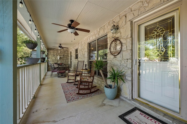 view of patio / terrace with a porch and ceiling fan