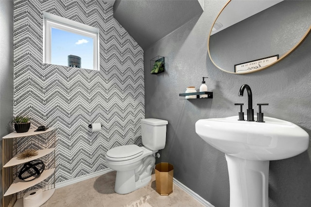 bathroom featuring toilet