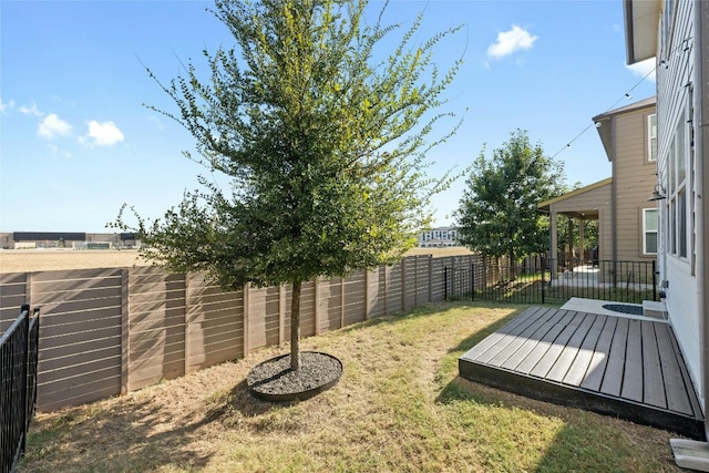 view of yard with a deck