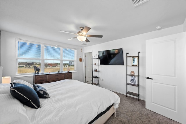 carpeted bedroom featuring ceiling fan