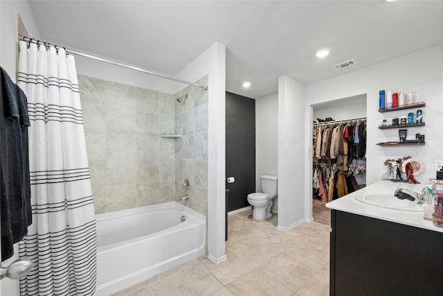 full bathroom featuring vanity, shower / tub combo with curtain, toilet, and tile patterned flooring