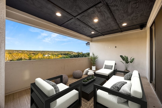 balcony with an outdoor hangout area