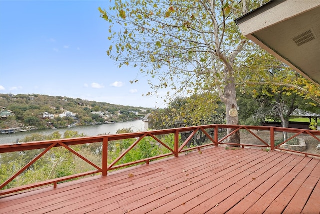 deck featuring a water view