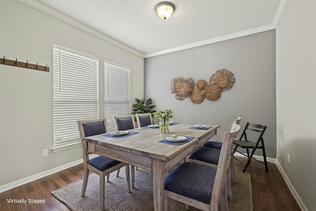 dining area featuring crown molding and dark hardwood / wood-style flooring