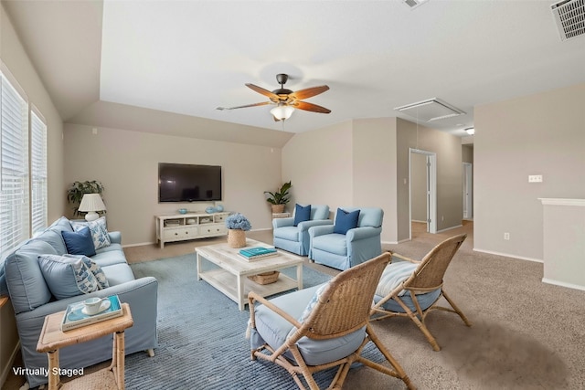 living room featuring carpet, vaulted ceiling, and ceiling fan