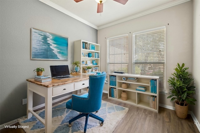 office space with light hardwood / wood-style flooring, ornamental molding, and ceiling fan