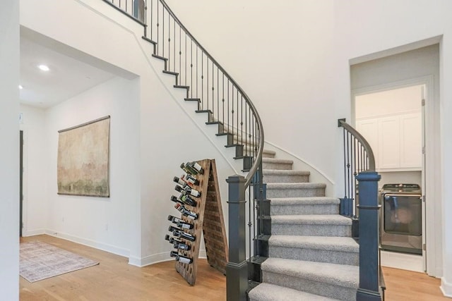 staircase featuring hardwood / wood-style flooring