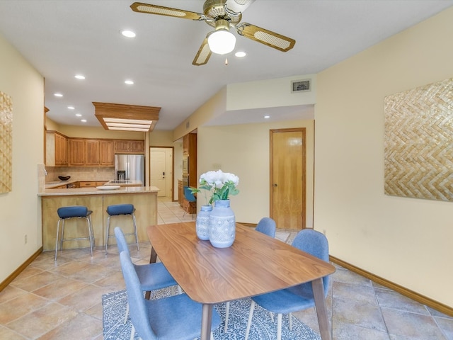 dining area with ceiling fan