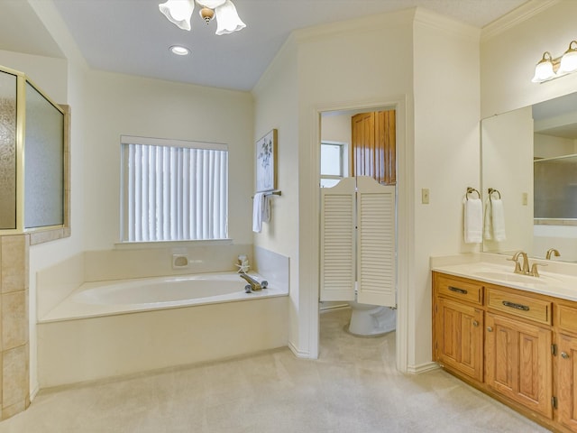 bathroom featuring independent shower and bath, vanity, and ornamental molding