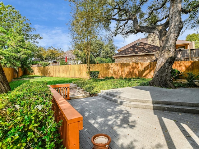 view of yard featuring a deck