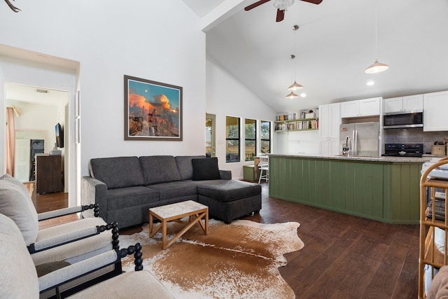 living room with dark hardwood / wood-style floors, high vaulted ceiling, and ceiling fan