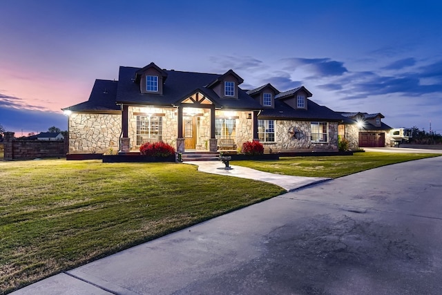 view of front of property with a yard