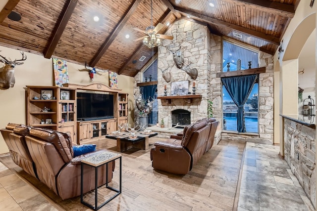 living room featuring wood ceiling, beam ceiling, high vaulted ceiling, and ceiling fan