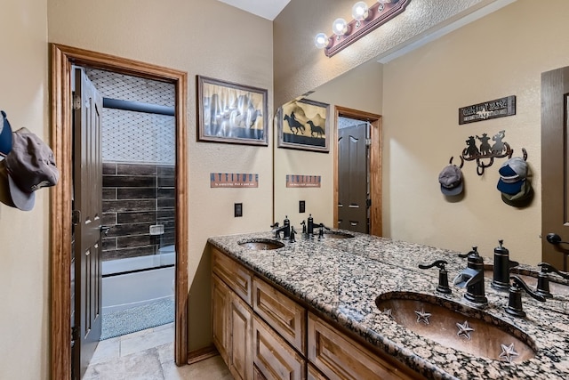 bathroom featuring vanity and a shower