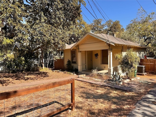 view of front of home featuring cooling unit