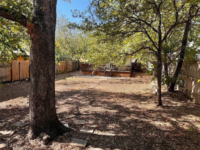 view of yard with a deck