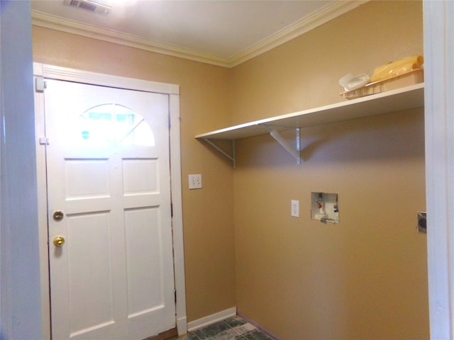 clothes washing area featuring crown molding and washer hookup