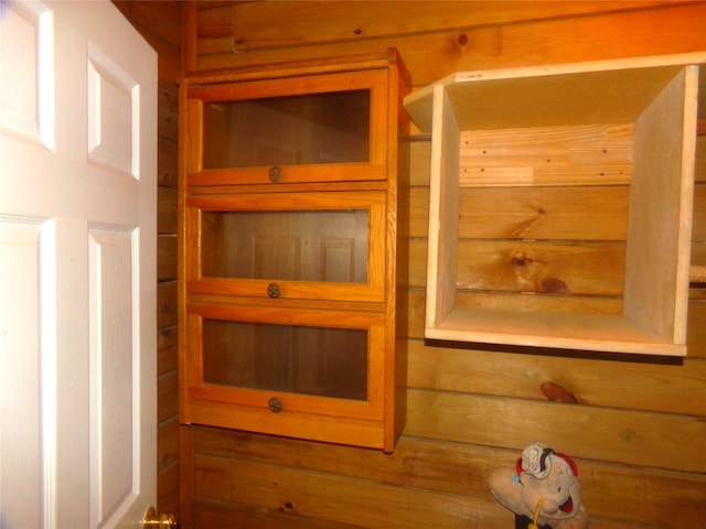 room details featuring wooden walls